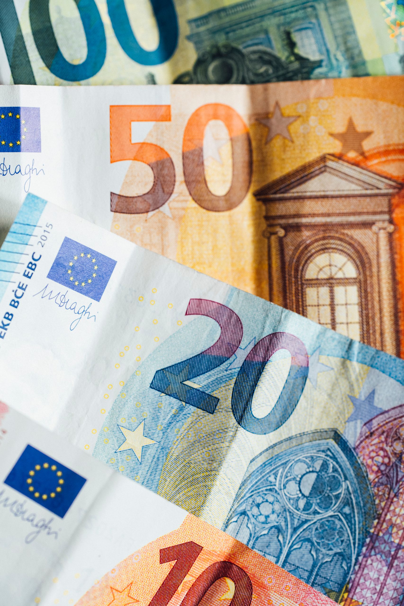 Embryo Donation 5 Close-up of various denominations of Euro banknotes, showcasing European currency details.